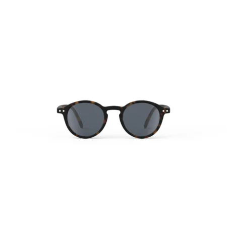 Tortoiseshell round sunglasses with dark lenses on a white background.