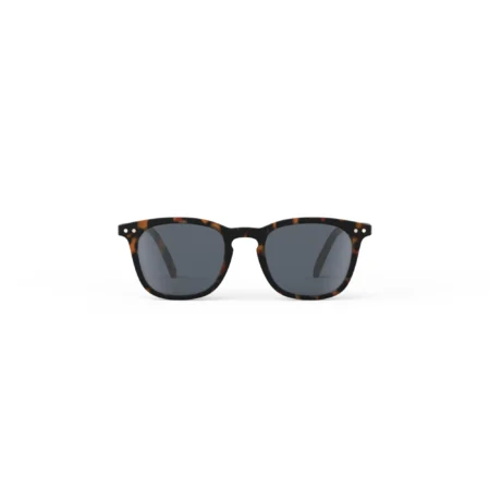 Tortoiseshell sunglasses with dark gray lenses on a white background.