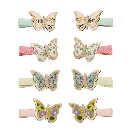 Six pastel butterfly hair clips with fabric bands arranged in two columns (mint, pink, yellow, cream).