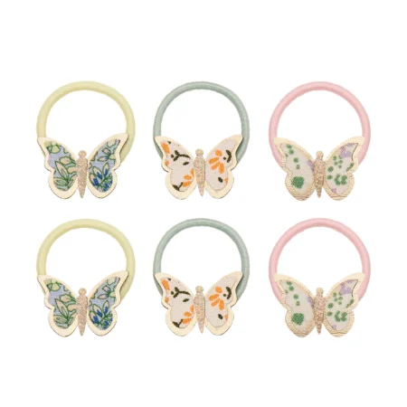 Six pastel butterfly-embellished hair elastics arranged in two rows of three (yellow, mint, pink hues).
