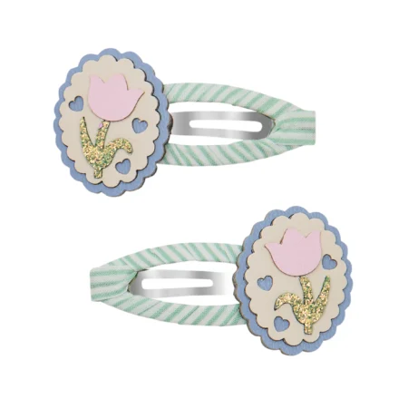 Pair of decorative hair clips featuring a scalloped blue flower with a pink tulip and glitter stem on a mint striped band.
