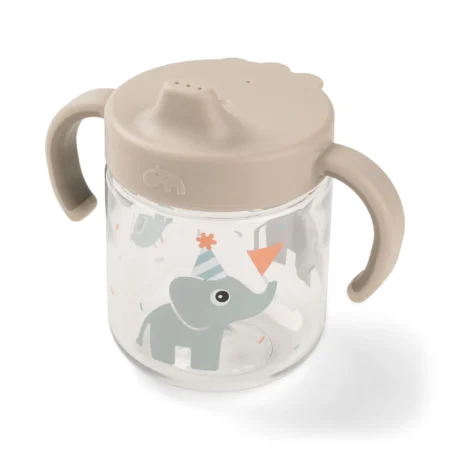 Toddler sippy cup with two handles and an elephant party-print on a clear body with a beige lid