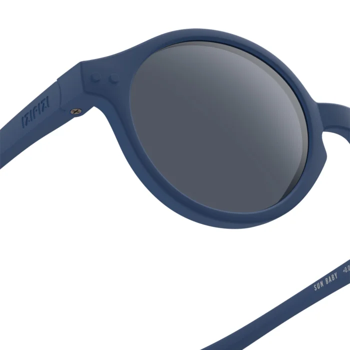 63_699c6a15ae641_700x700r Blue round sunglasses with mirrored lenses and matching blue temples (brand visible).