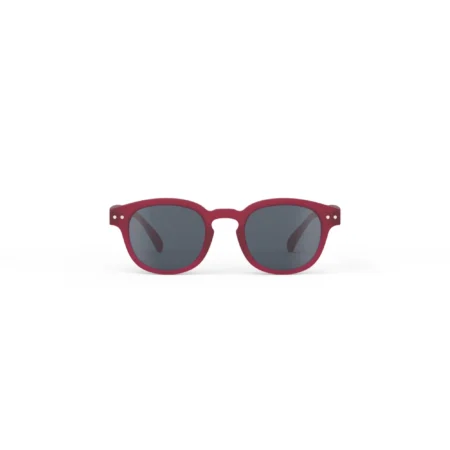 Red-framed sunglasses with dark lenses centered on a white background.