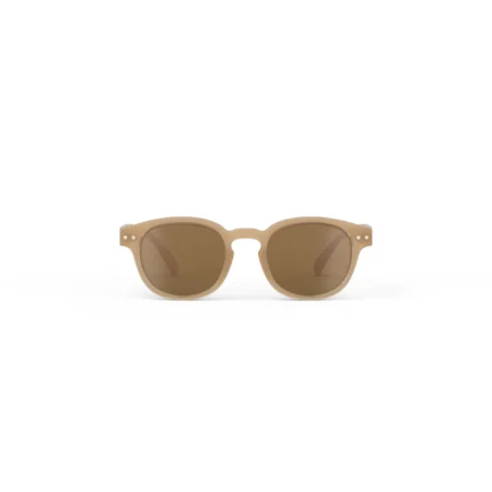 Beige sunglasses with brown lenses centered on a white background (product photo).