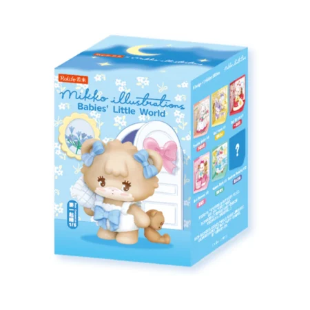Blue toy-box packaging labeled 'Milk illustrations Babies' Little World' with a small tan teddy bear wearing blue bows at the front.
