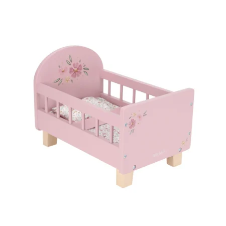 Pink wooden doll bed with floral decals, a flower-patterned mattress, and light wood legs for a child’s doll.