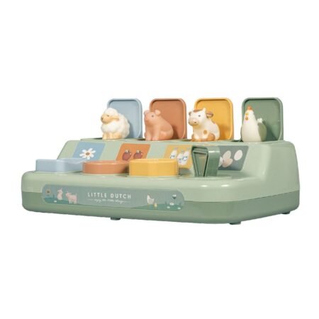 Pastel green Little Dutch toy piano with four animal figurines on top (sheep, pig, cow, chicken)