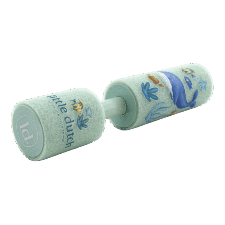 Sea-themed rolling stamp toy in pastel teal with dolphins, stars and waves; used to stamp decorative patterns on crafts.